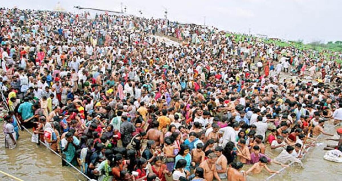 Godavari Pushkaram Thousands Of Pilgrims Take Holy Dip On Day Two