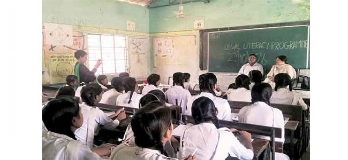 Delhi school girl with teacher