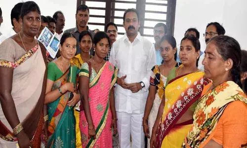 Dy CM assures job security to contract staff in Eluru