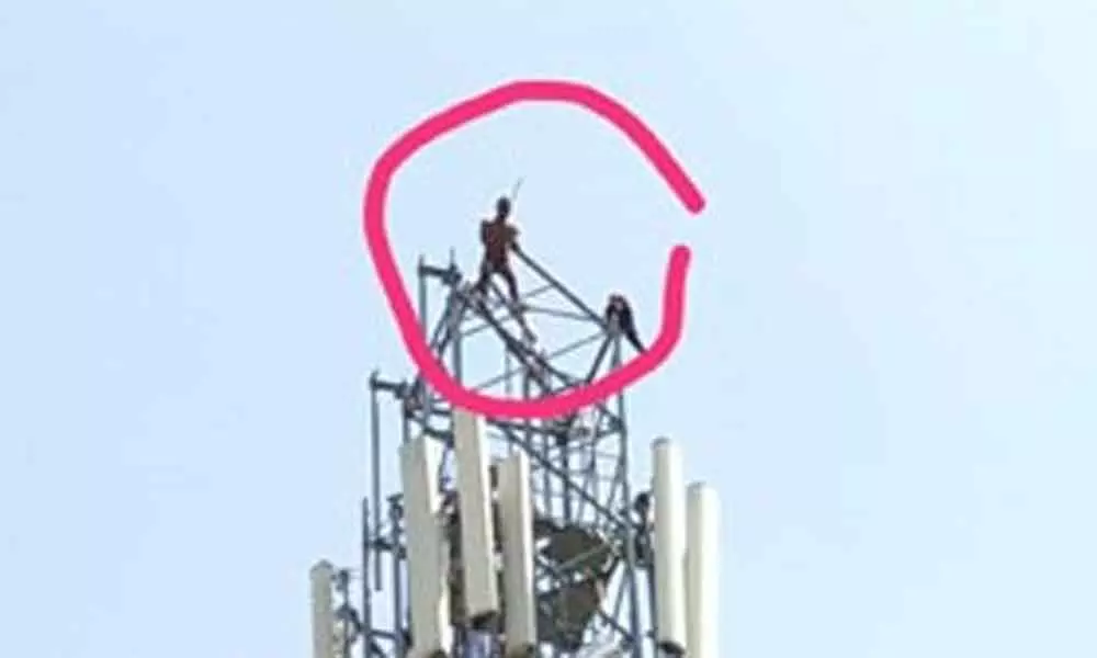 Telangana: Man demanding advent of Prabhas climbs cell tower in Jangaon