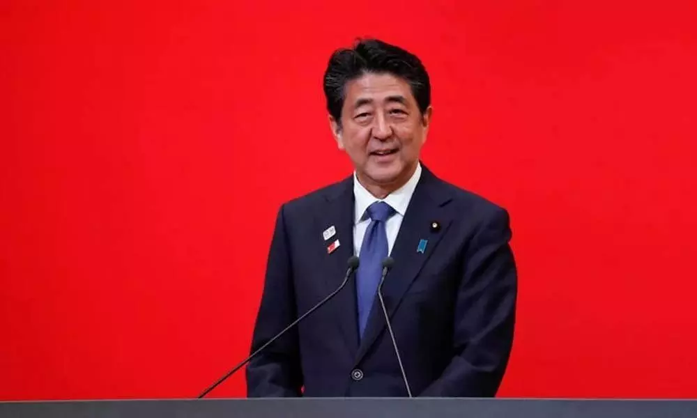 Japan PM reshuffles cabinet, aims to boost public support