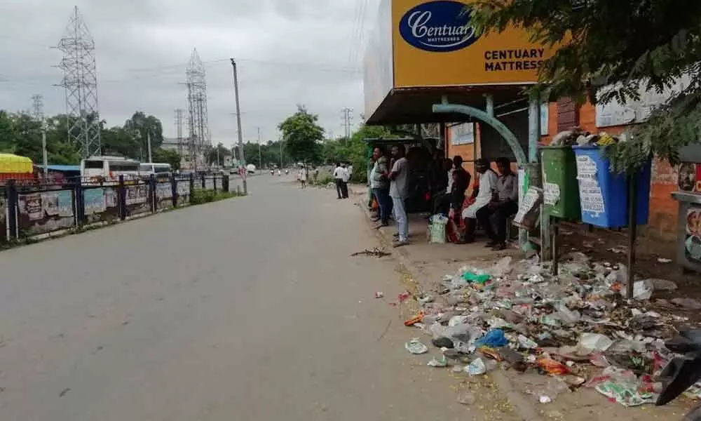 Garbage near bus stop stinks, passengers fume
