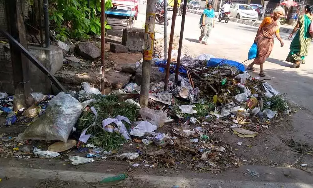 Locals dumping garbage on road