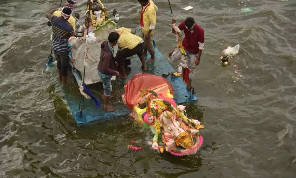 Ganesh idol final immersion started from morning hours at Tankbund amidst tight security