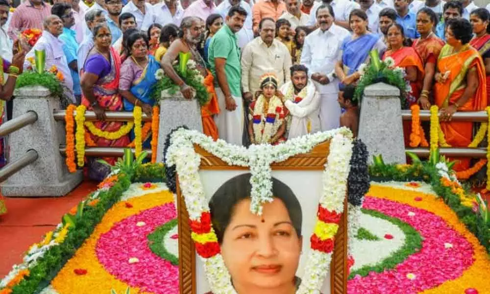 AIADMK leader decks up Jayalalithas samadhi, turns it into sons wedding venue