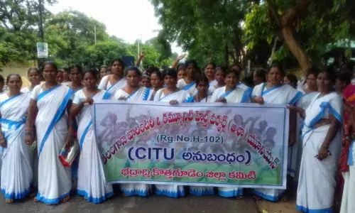 Asha workers stage protest seeking fixed salaries in Kothagudem