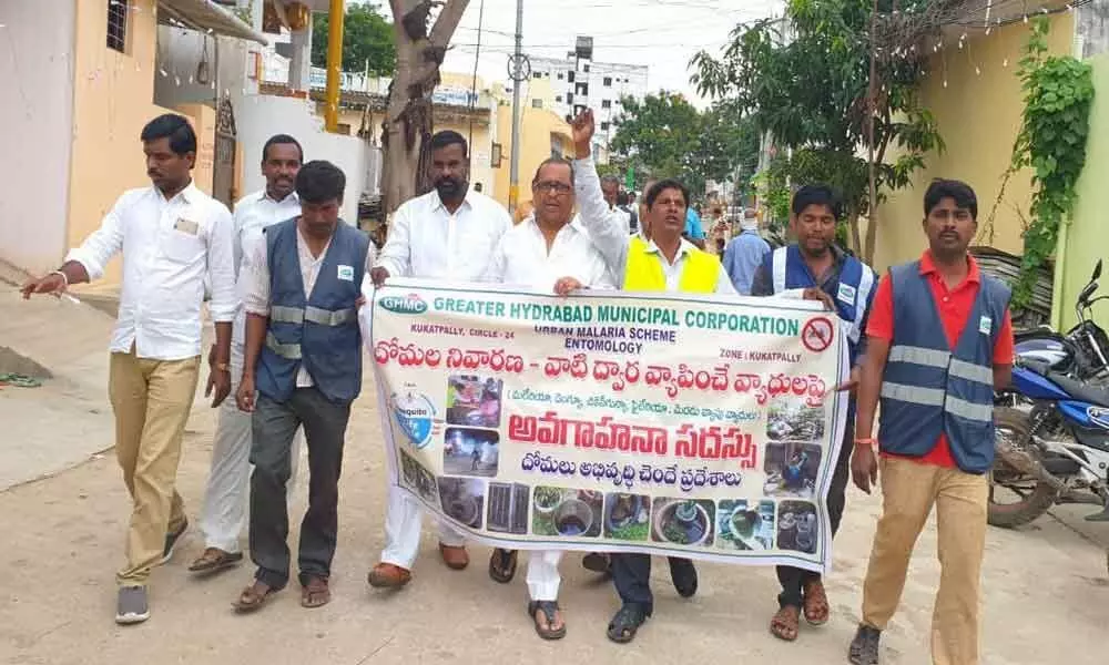 Corporator Dodla Venkatesh Goud leads rally against dengue