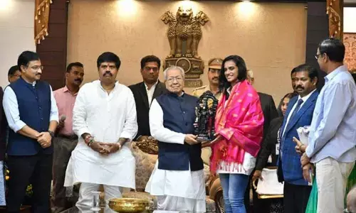 PV Sindhu meets AP Governor Biswabhusan Harichandan