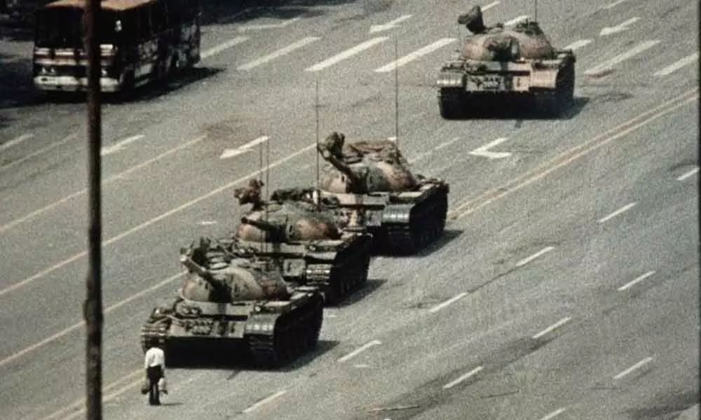 Tiananmen Square photographer behind iconic tank man shot passes away at 64