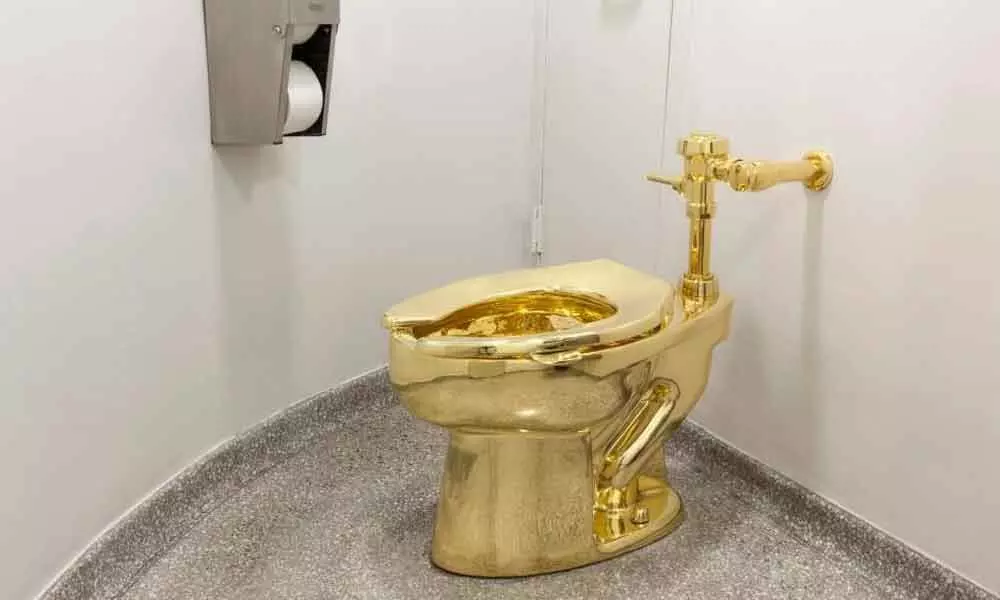 Solid gold toilet stolen from English stately home