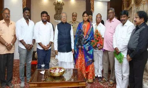 Guv fetes archer Jyothi Surekha in Vijayawada