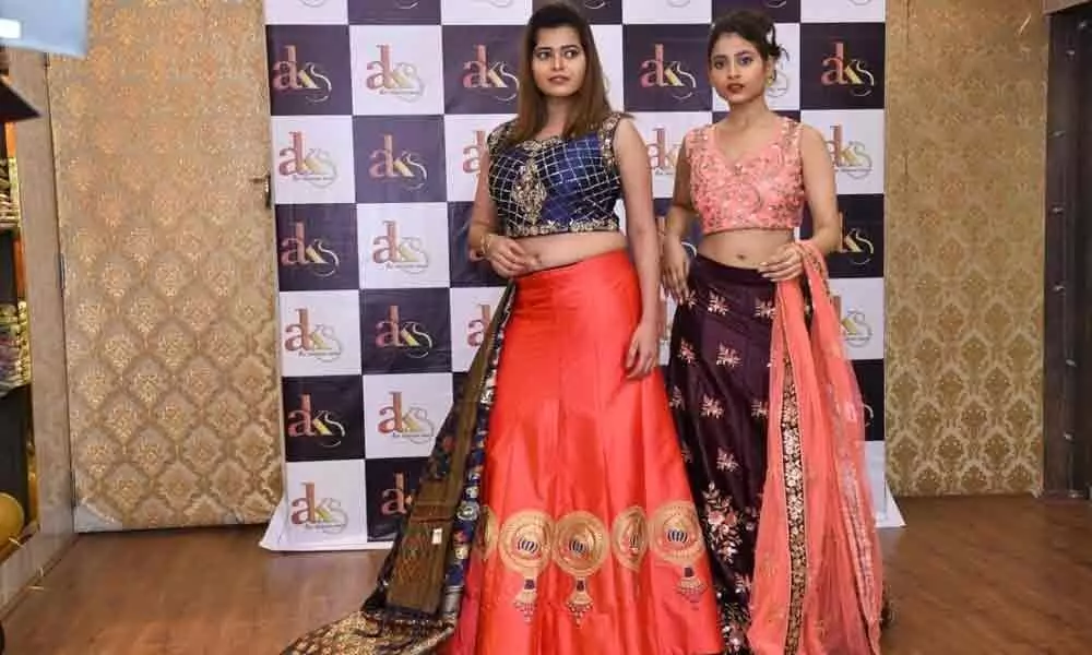 Aks designer store opens in city