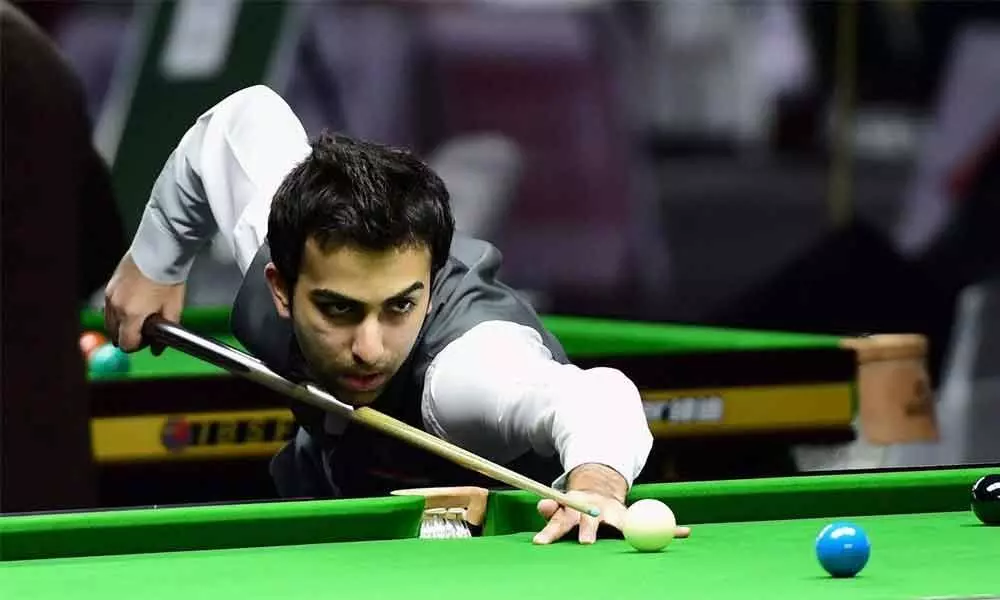 Advani bags 22nd World Billiards title