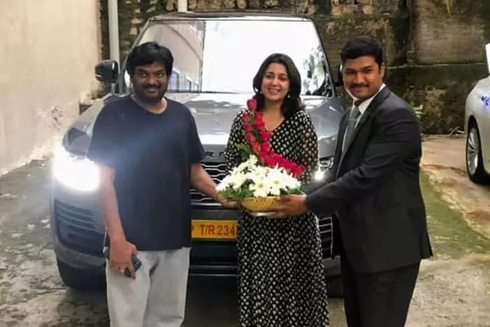 Puri Jagannadh and Charmee receive keys to the New Range Rover... Charmee says Pinchh me nowwww