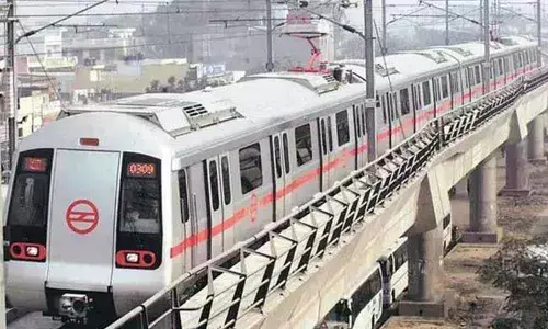 Woman jumps in front of metro train