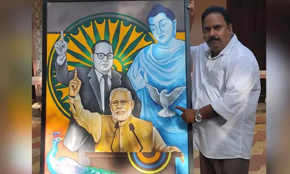 City artist honours PM Modi with his paintings in Vijayawada