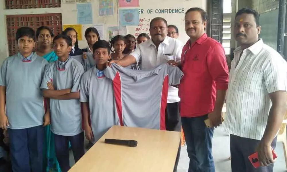 Sports jerseys gifted to students