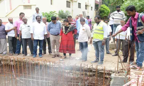 Corporator Mudraboyina Srinivas Rao checks works quality