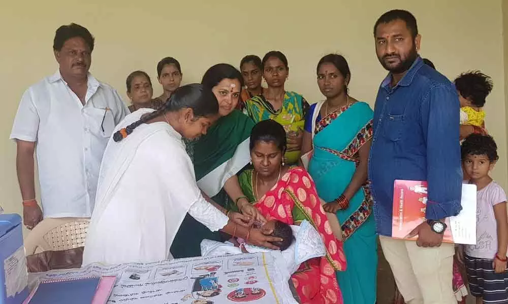 Corporator Lakshmi Prasanna launches vaccination at Saibaba Kalyana Mandapam in Vaidehi Nagar