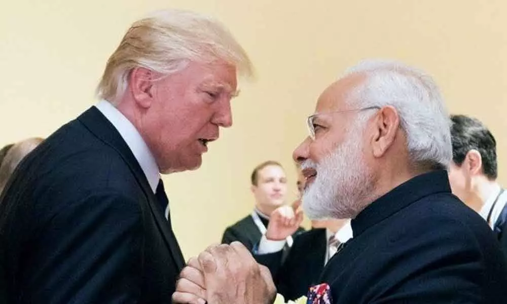 Trump hints a deal at Howdy Modi! event