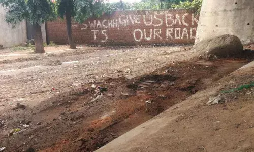 Reopen service road blocked by Local Military Authority