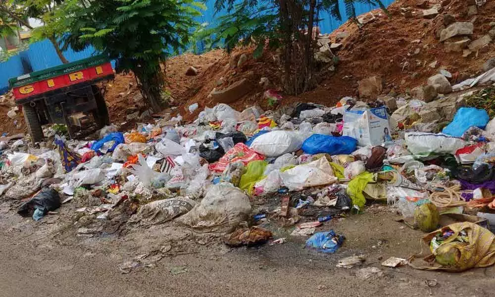 Garbage dumped on road at Kondapur