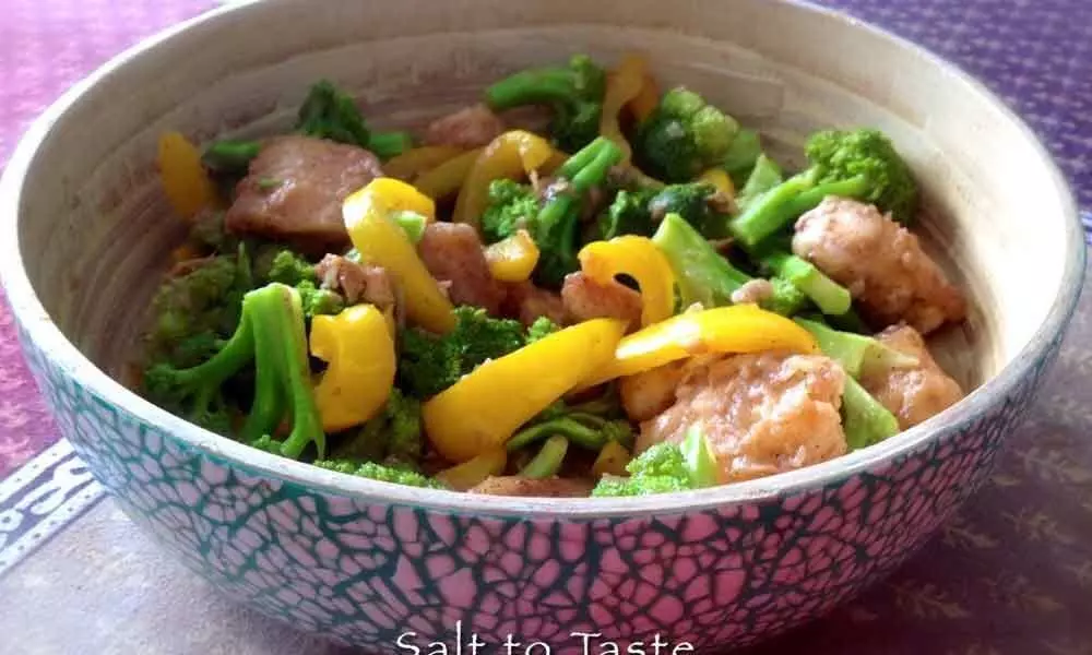 Stir fried fish with broccoli and bell peppers