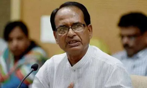MP flood politics: Shivraj sings in protest, Cong says drama