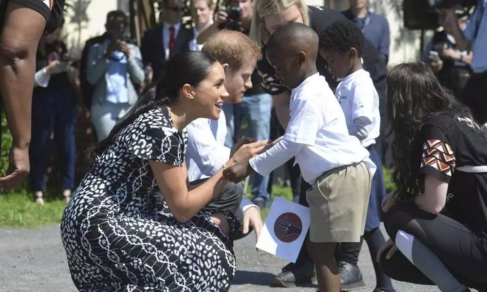 Harry and Meghan start 1st official tour as family in Africa