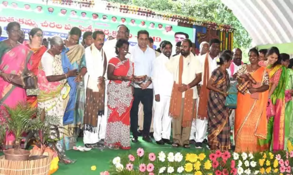 KTR distributes Bathukamma saris in Nalgonda