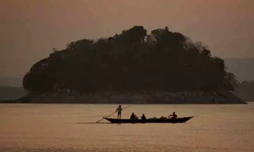 Schools use boats to distribute exam papers in Tripura