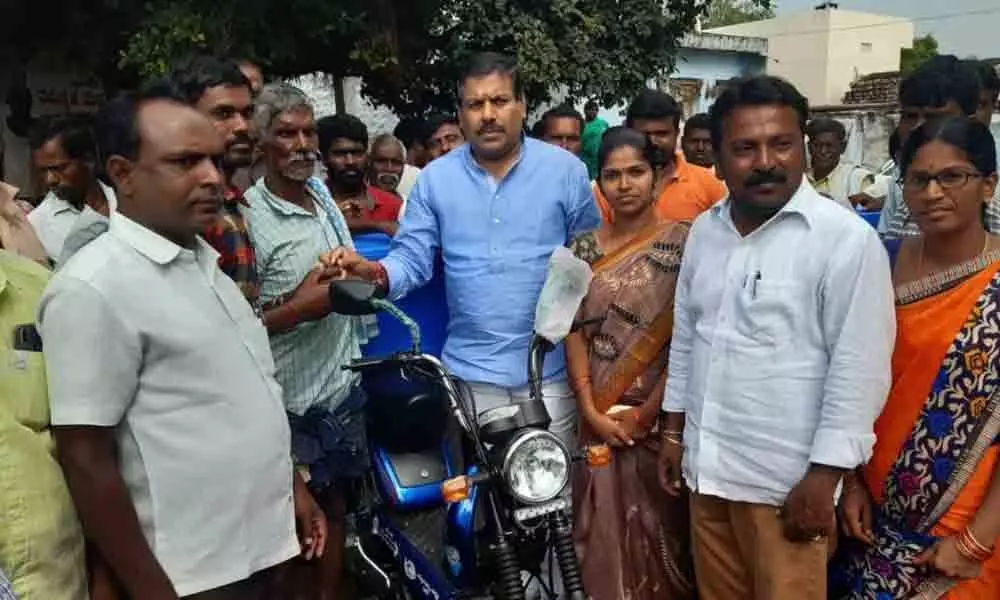 Nagarkurnool: Two-wheelers to help fishermen sell their catch distributed