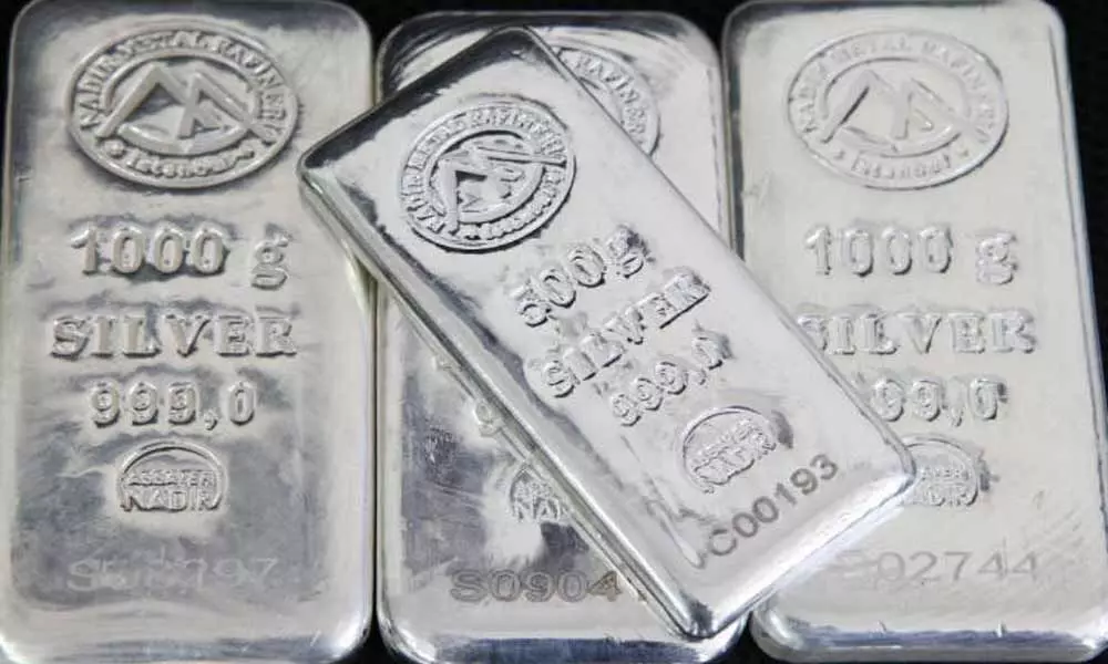 Silver futures slump by Rs 214 per kg on weak global cues