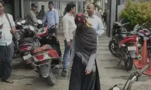 Woman held for targeting school principals with morph photos