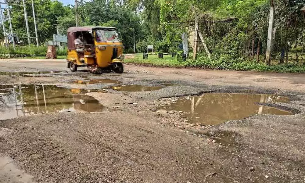 AOC roads filled with potholes
