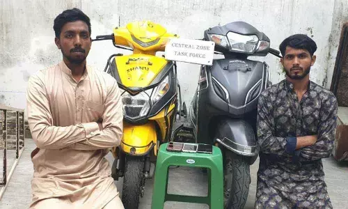 Two held for threatening, thrashing youth