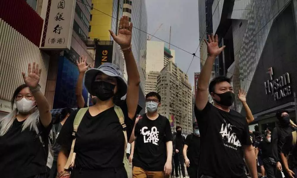 Hong Kong upholds ban on National Day march after violence