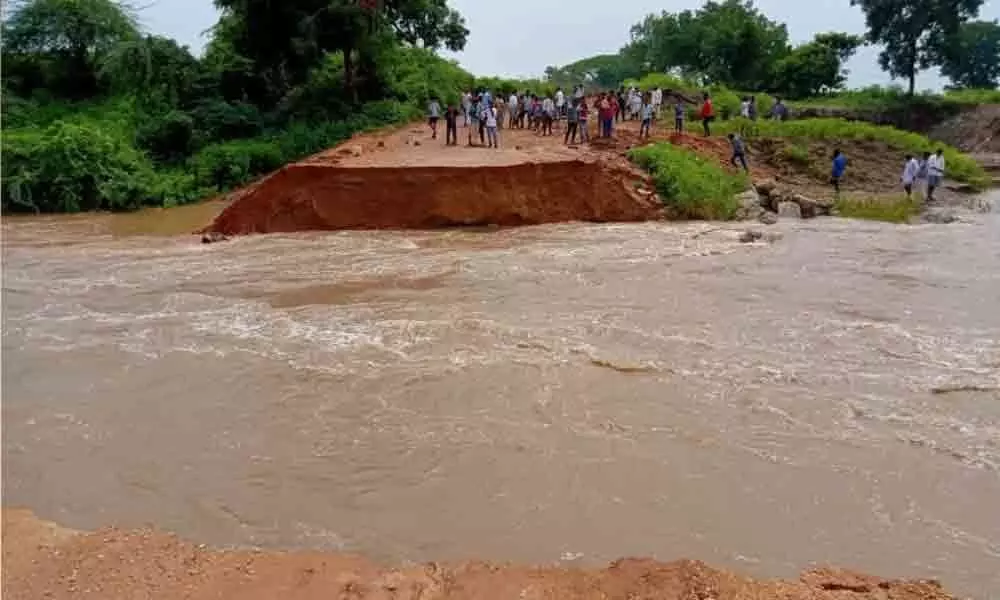 Heavy rains wash away the makeshift bridge in Kamareddy