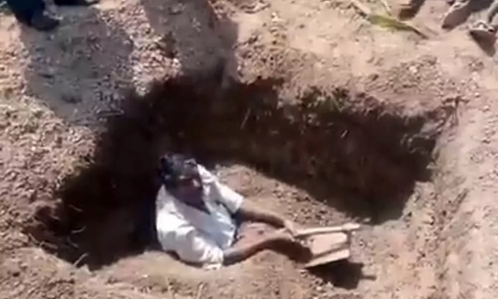 Man Tried To Bury Himself For Refusing His LAnd Pass Book