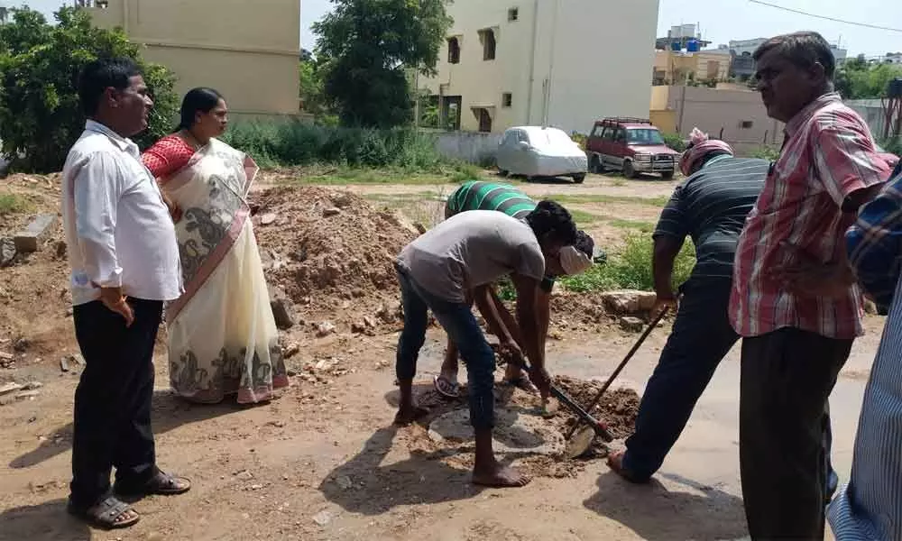 Corporator Cheruku Sangeetha inspects drainage system