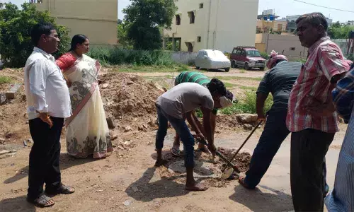 Corporator Cheruku Sangeetha inspects drainage system