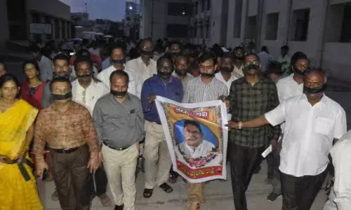 Revenue Employees protest against government in Nizamabad