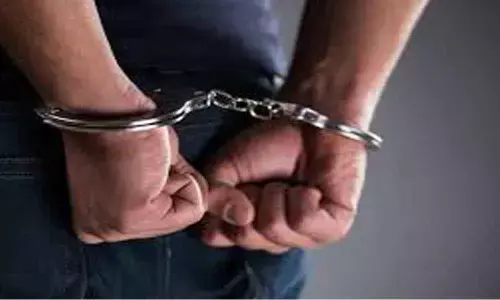 Man held for harassing senior police official
