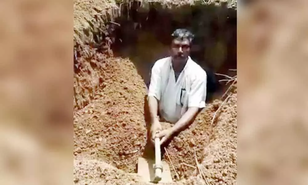 Farmer from Warangal tries to bury self after being denied pattadar passbook