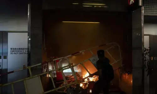 Hong Kong suspends trains, appeals to public after rioting