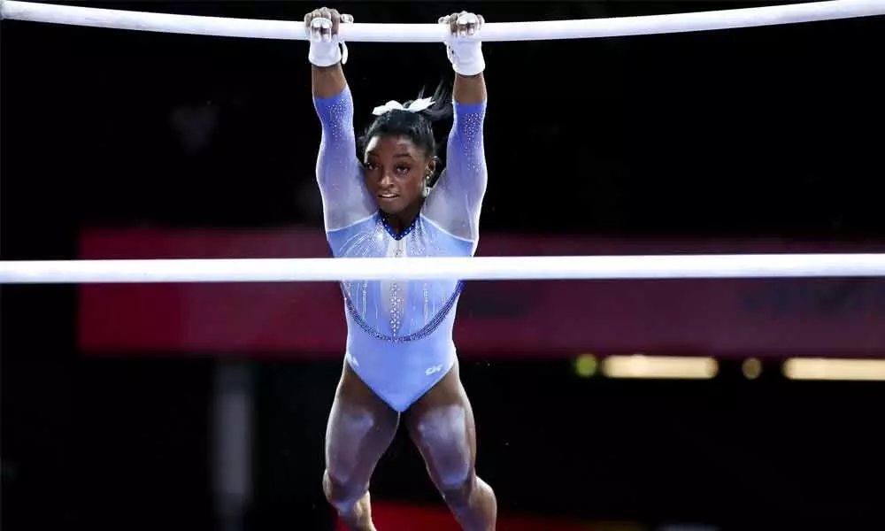 Biles jaw-dropping moves help US top World Gymnastics qualifier