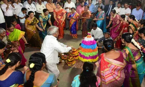 Andhra Bank staff play Bathukamma