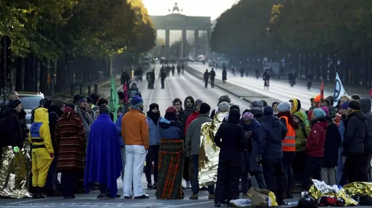 Protests to combat climate change block roads in European cities
