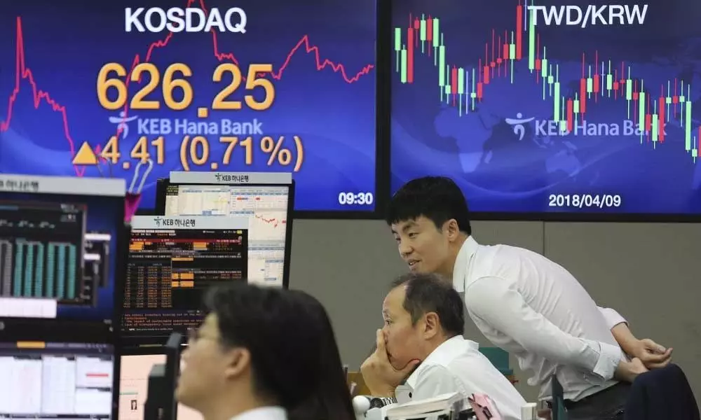 Global shares mixed on US jobs; eyes on China trade talks