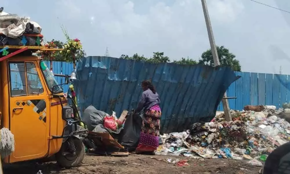 GHMC staff dumping garbage in our area